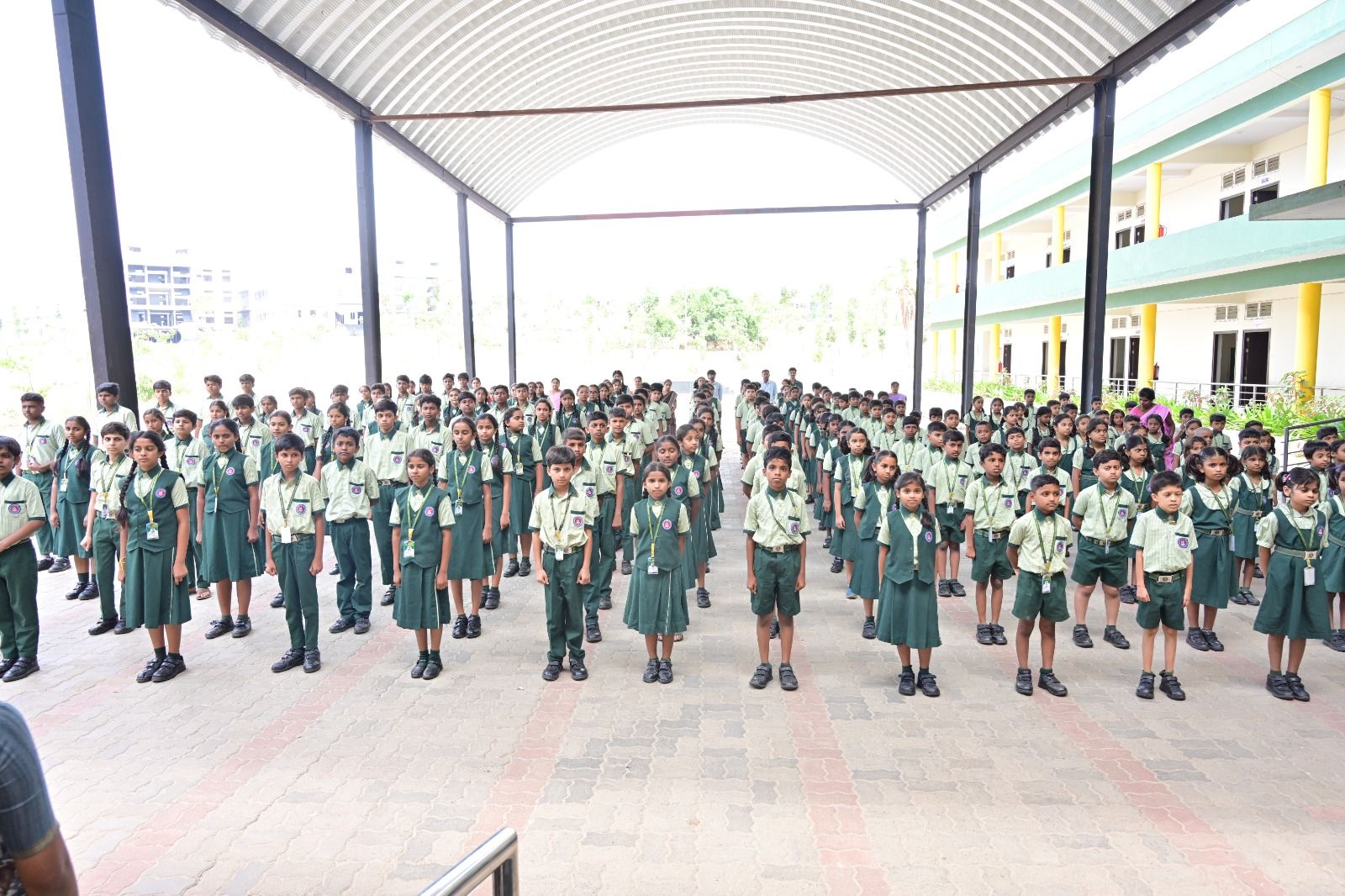 Students gathered in the covered prayer hall for morning assembly