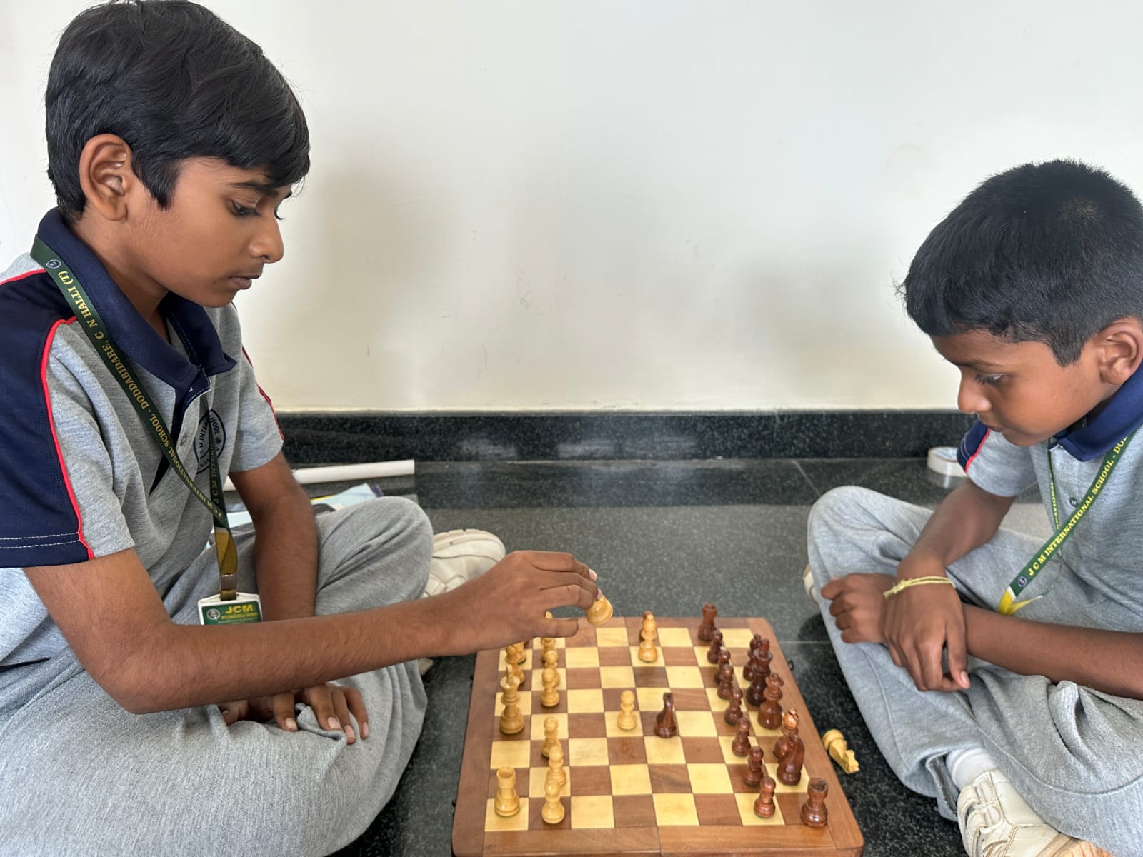 Two students playing chess